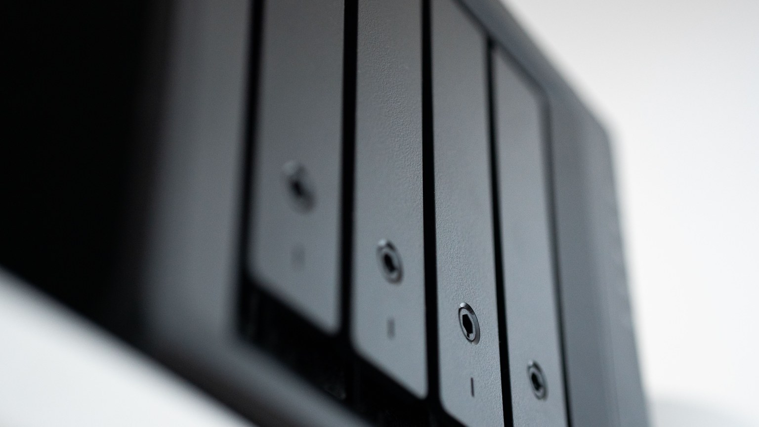Detailed view of a black data storage unit highlighting modern technology and data management.