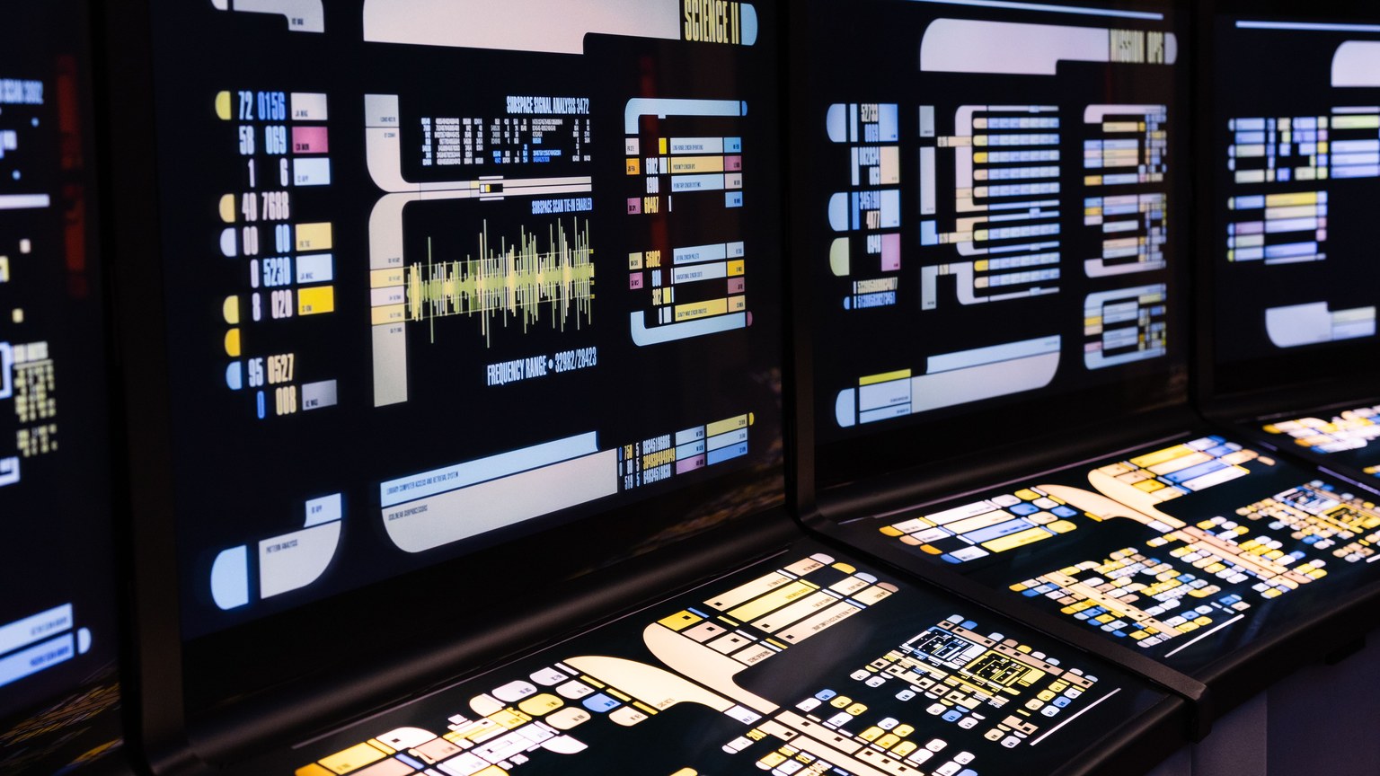 High-tech command center with advanced digital displays and control panels