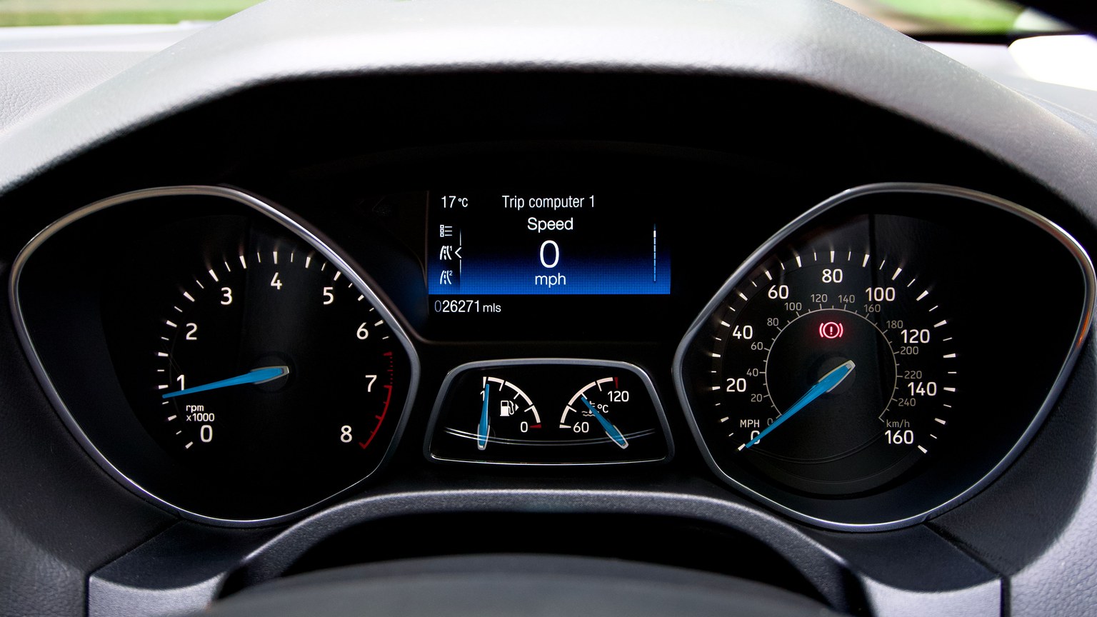 Close-up view of a Ford Focus dashboard showing the speedometer and various gauges.