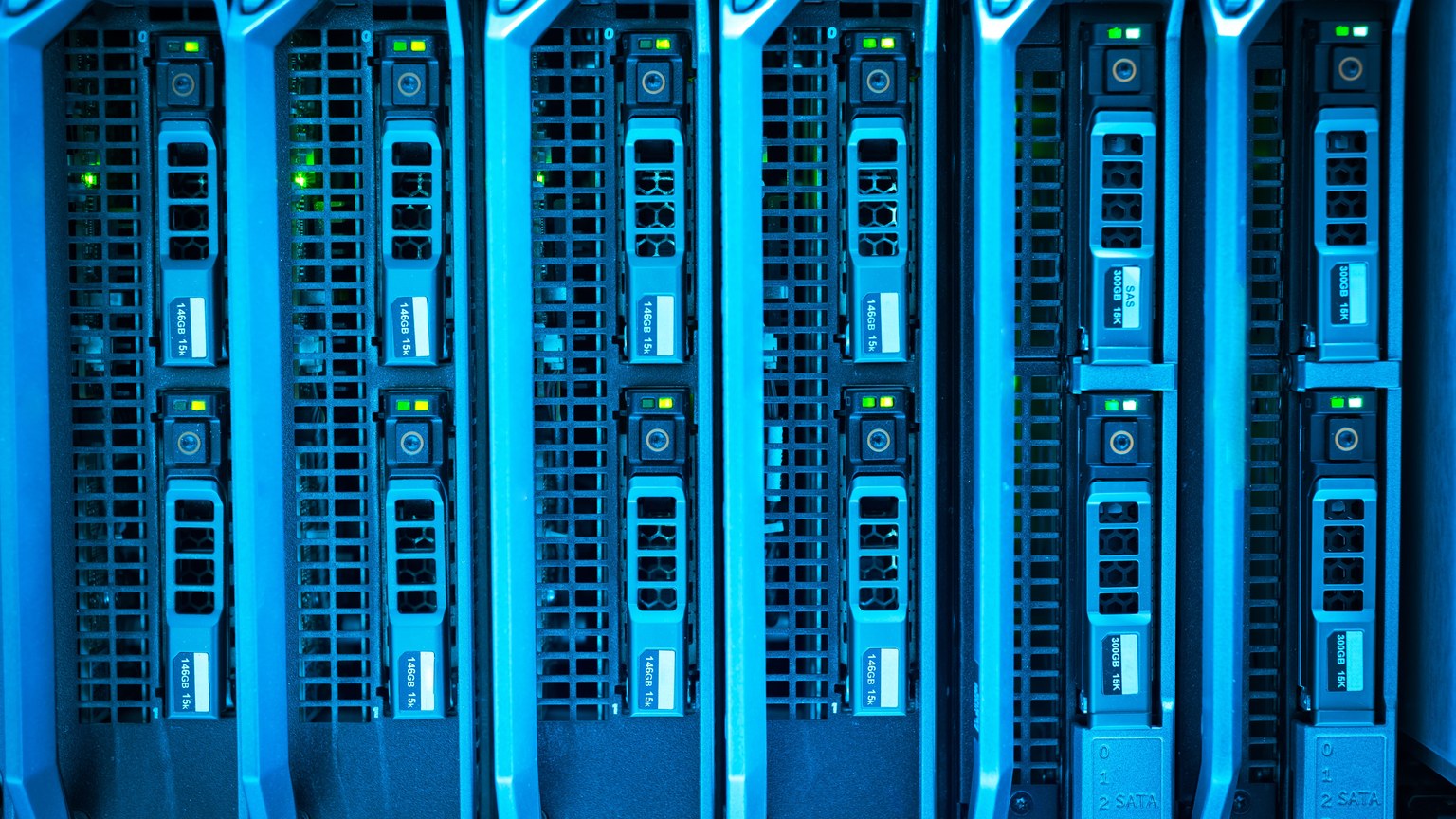 Detailed image of illuminated server racks showcasing modern technology infrastructure.