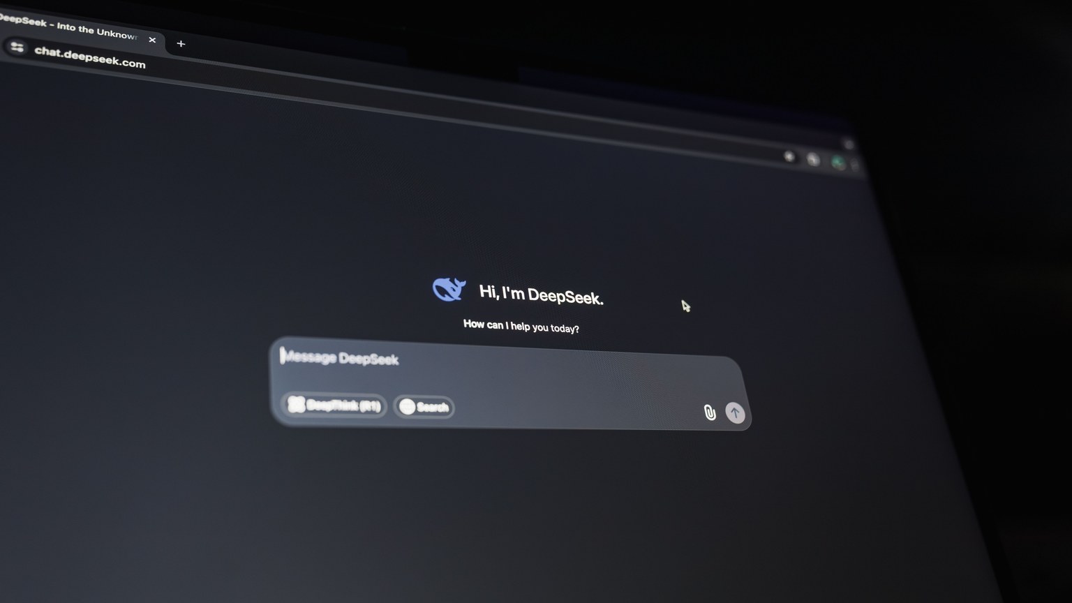A dark-themed chat interface displaying an AI assistant conversation starter on a screen.